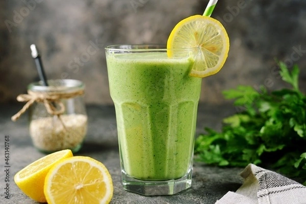 Fototapeta Healthy smoothie with cucumber, parsley, oatmeal and lemon juice.
