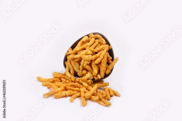 Fototapeta SNACKS STICKS CORN, isolated Image kurkure or namkeen sticks, background image.