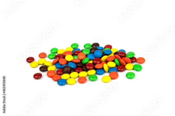 Fototapeta Colorful chocolate in and out of focus on white background.