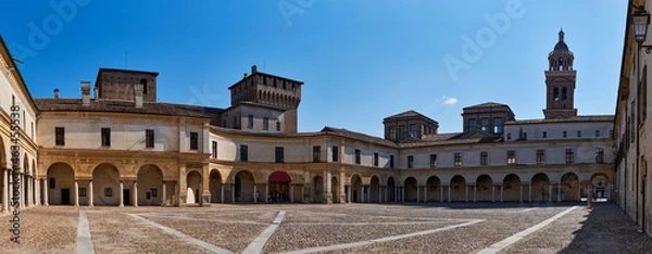 Fototapeta Panoramic view of a medieval square and entrance to the palace