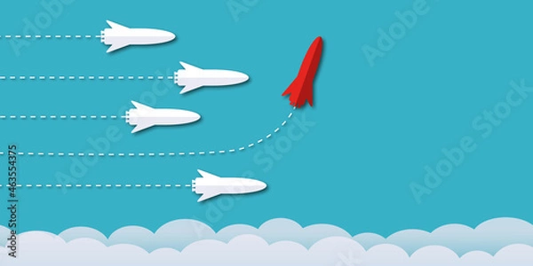 Obraz Red rocket among the white rockets changed direction on blue background as metaphor for business creativity new idea to discovery innovation technology. Space for the text. paper art design style.