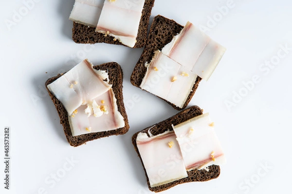 Fototapeta sandwich black bread with bacon