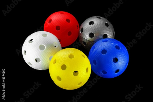 Obraz Five floorball balls isolated on a black background