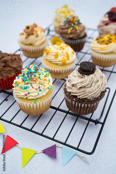Obraz Cupcakes with different flours on a grid