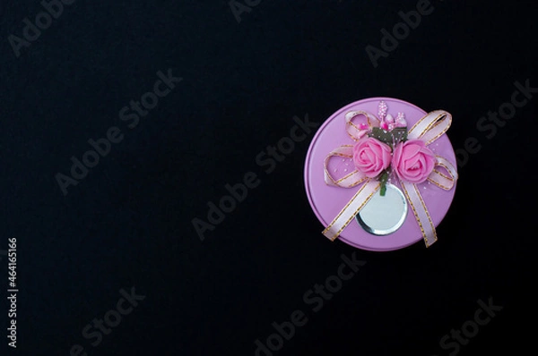 Fototapeta Christmas gift boxes isolated on black background, except copy space.