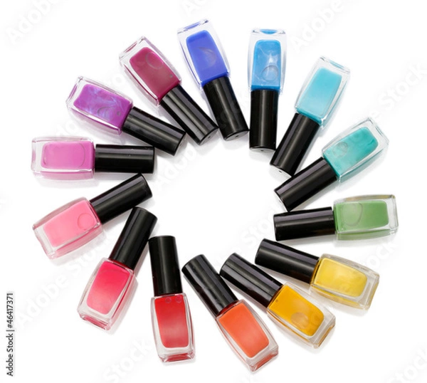 Fototapeta Group of bright nail polishes isolated on white