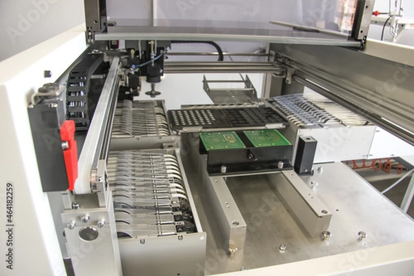 Fototapeta Factory for the electronic production. Technological process of soldering and assembly chip components on pcb board. Automated soldering machine