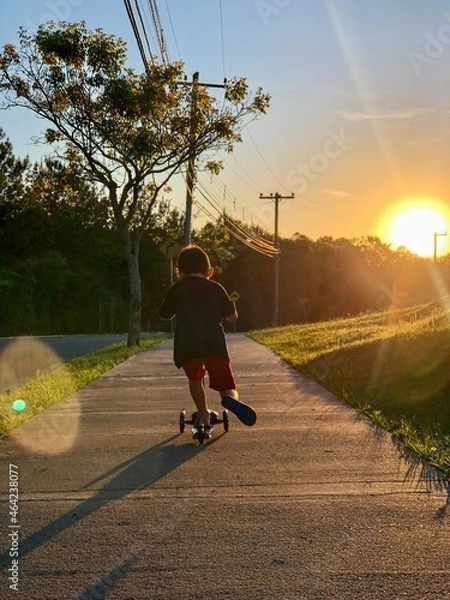 Obraz child riding a bike