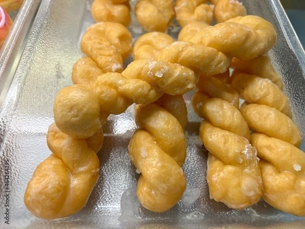 Fototapeta Close-up photo of Sugar twist, a dessert made from flour and sugar. It is commonly consumed by the general public. It smells delicious and colorful.