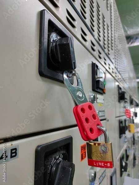 Fototapeta Lockout Tagout , Electrical safety system.Key lock switch or circuit breaker for safety protect.in electric room