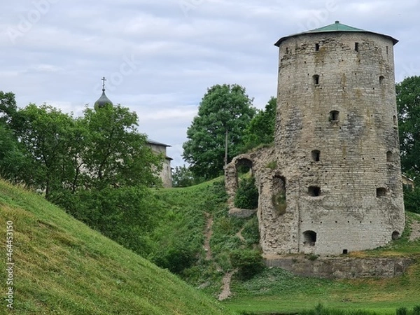 Obraz An old tower left over from the old walls of the Pskov Kremlin. Russia, Pskov, summer 2021 