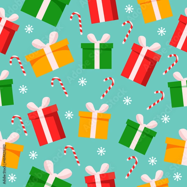 Fototapeta Holiday decor, colored gift boxes and candies on a blue background. Christmas theme. Seamless pattern. Can be used for wallpaper, fill web page background, surface textures