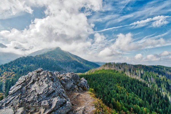 Obraz Beautiful mountains among the clouds.