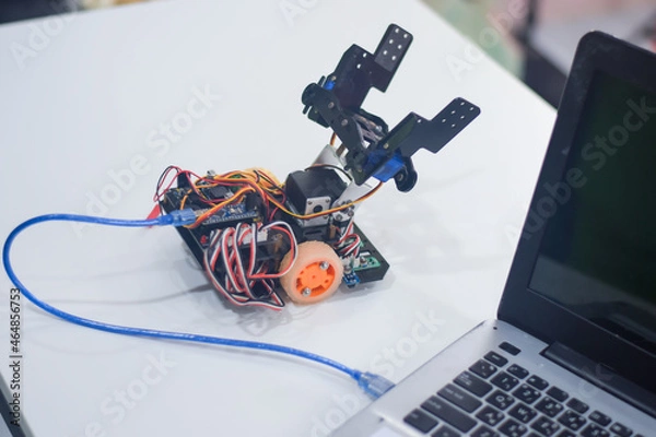 Fototapeta Program a robot to follow a line.