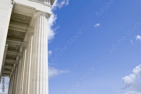 Obraz Stone Columns with Portico roof with Blue Sky area for your text