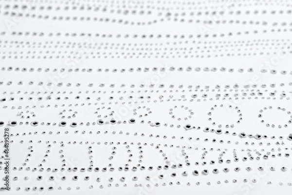 Obraz Texture of pierced paper. Simple dot pattern.