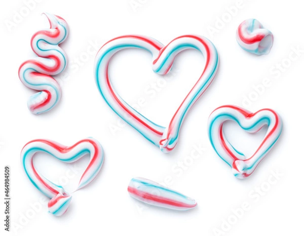 Fototapeta Closeup Three Colored Toothpaste Sample Set Isolated