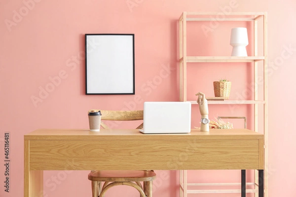 Fototapeta Interior of modern room with workplace near color wall