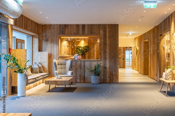 Obraz rustic foyer made of old wood and retro furniture with harmonious indirect lighting