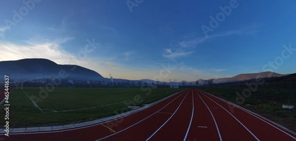 Obraz sunset above the athletic stadium
