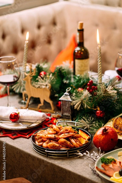 Fototapeta New Year festive served table with decorations and meal