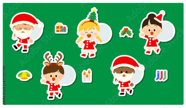 Fototapeta サンタクロースの仮装をしている子供たちとクリスマスアイテム