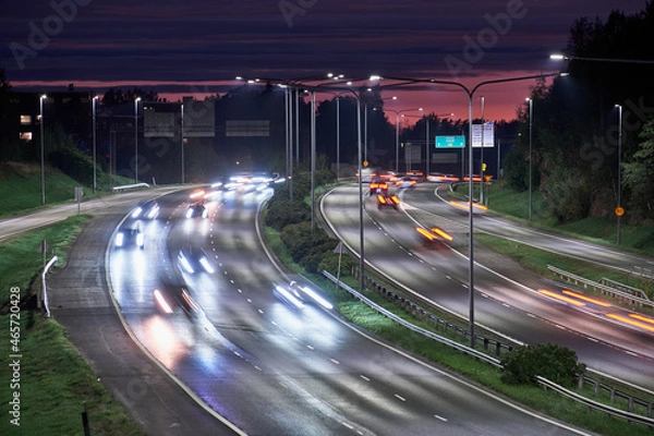 Fototapeta The highway traffic in the summer night in Espoo, Finland.