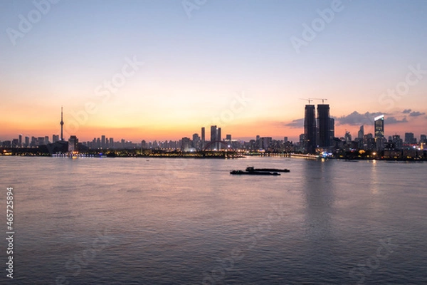 Fototapeta Wuhan skyline and Yangtze river with supertall skyscraper under construction in Wuhan Hubei China.	