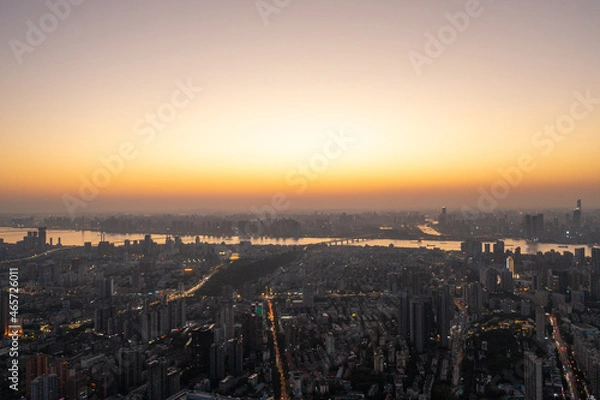 Obraz Wuhan skyline and Yangtze river with supertall skyscraper under construction in Wuhan Hubei China.	