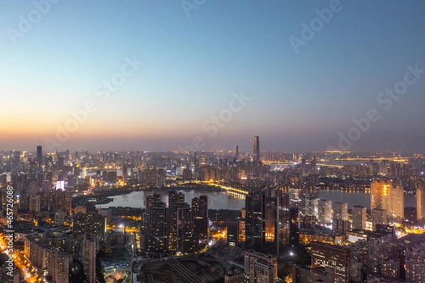 Fototapeta Wuhan skyline and Yangtze river with supertall skyscraper under construction in Wuhan Hubei China.	