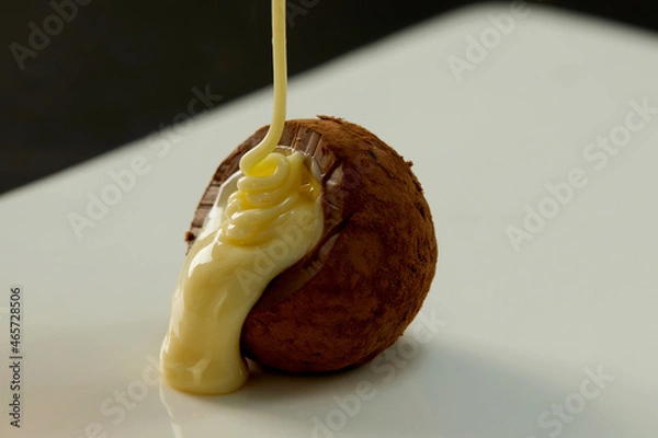 Obraz Cooking chocolate truffles, premium creamy chocolate falling from above