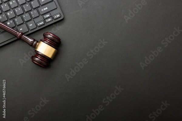 Obraz Judge gavel with computer keyboard. Concept of internet crime. Copy space for text