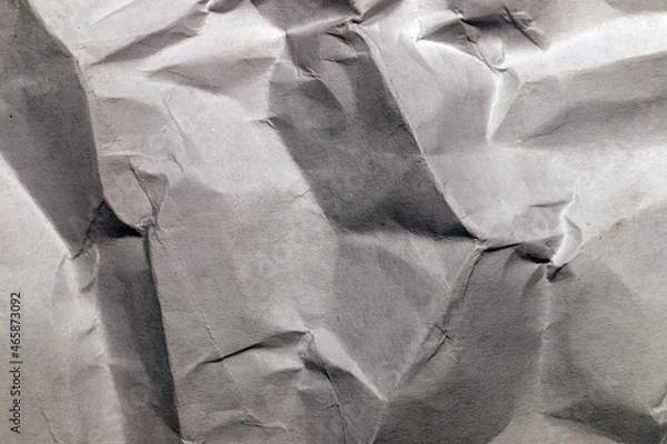 Obraz Contrasting grey crumpled paper with textured folds close-up
