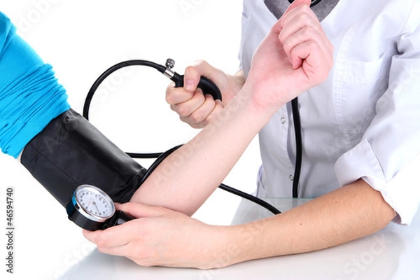 Fototapeta Blood pressure measuring isolated on white