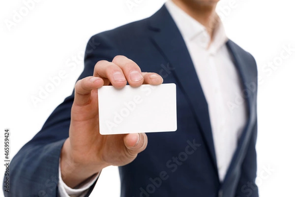 Obraz Young businessman is showing the word. Your text here