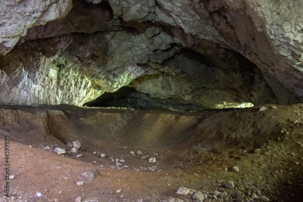 Obraz Cave with dim light shining in