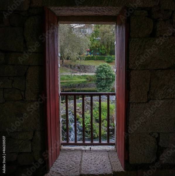 Obraz old door to the river