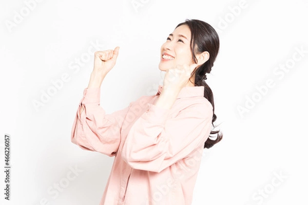 Fototapeta ガッツポーズをする女性