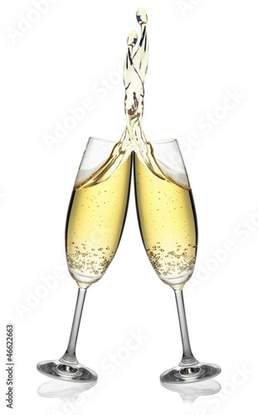 Fototapeta Pair of flutes making an elegant splash of champagne.
