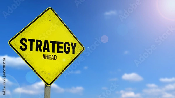 Fototapeta 3D-Illustration of a yellow warning sign that says 'STRATEGY AHEAD' in front of a blue sky
