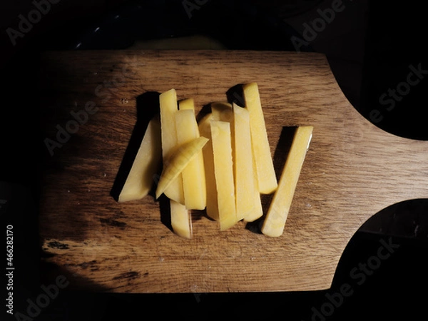 Obraz Shoestrings on a cutting board