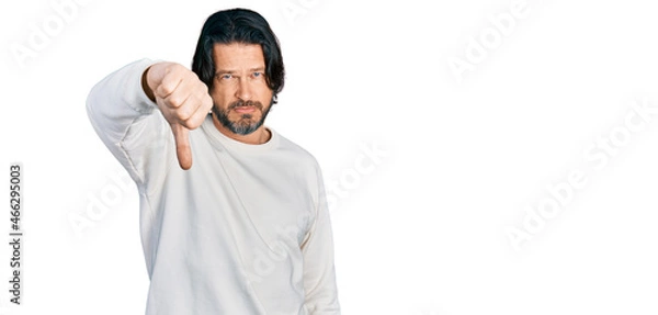 Fototapeta Middle age caucasian man wearing casual clothes looking unhappy and angry showing rejection and negative with thumbs down gesture. bad expression.