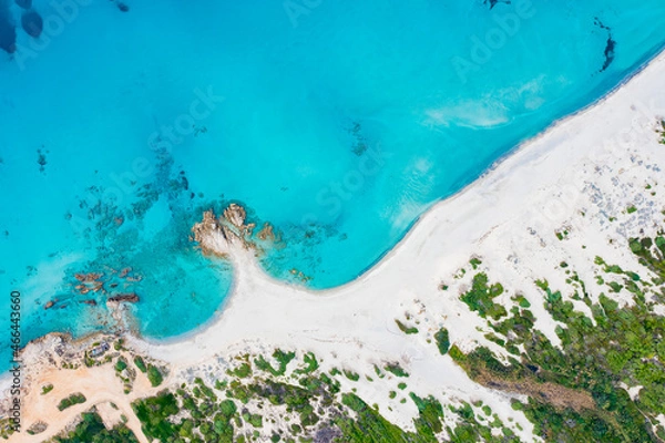 Fototapeta View from above, stunning aerial view of a white sand beach bathed by a turquoise water. Rena Majore, Sardinia, Italy.