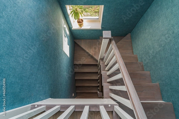 Fototapeta Staircase with wooden steps in a private house top view