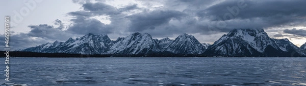 Fototapeta snowy mountains on a cloudy day