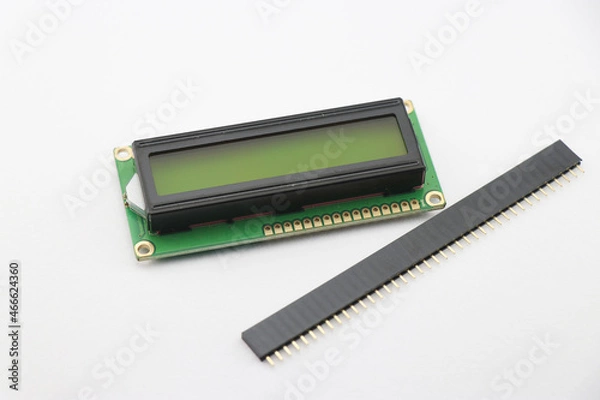 Obraz LCD display module with header pins, LCD 16x2 module isolated on white background