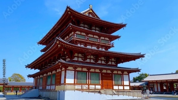 Obraz 桜花の季節の奈良　薬師寺　金堂