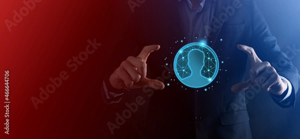 Fototapeta Businessman holding on hand icon of user man,woman low poly polygon style. Internet icons interface foreground. global network media concept.