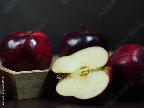 Obraz red apples on a black background