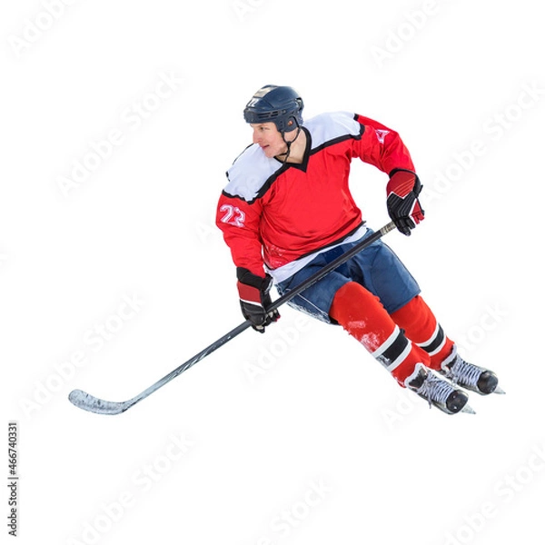 Fototapeta Professional ice hockey player on defending position on the rink. Isolated image on white